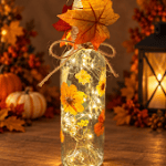 Lighted Fall Bottle Decor with Flowers and Autumn Leaves